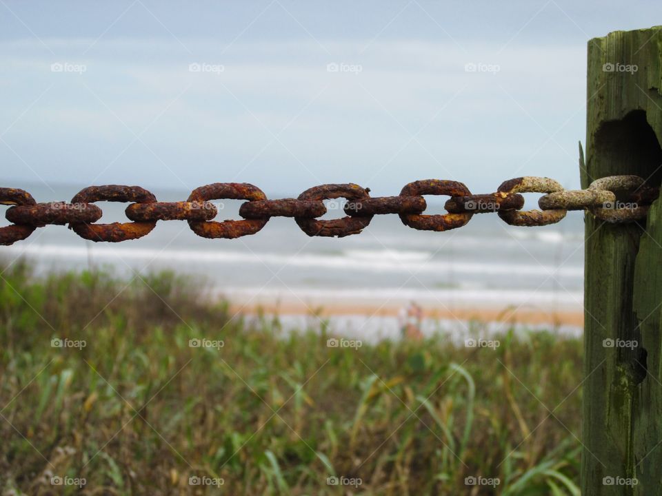 Water Corrosion Rusted Chain from the Beach Ocean Waters