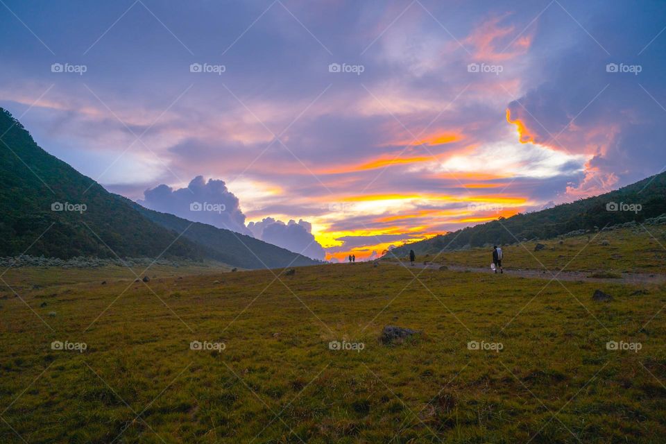 Thick clouds beautify the evening view on, Alun-Alun Surya Kencana, Mount Gede, Indonesia