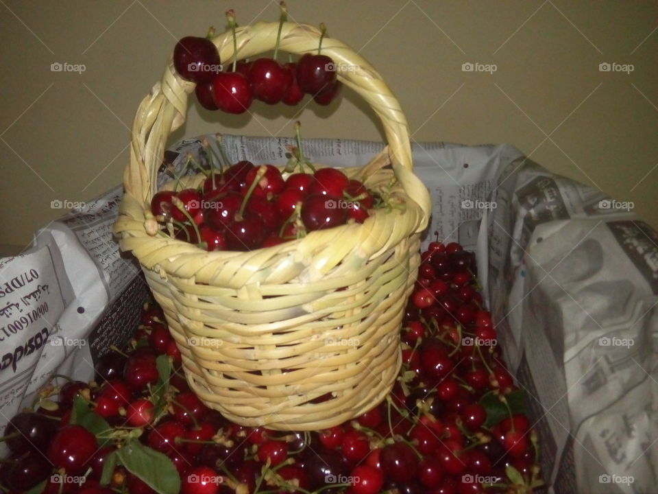 cherry in a basket of cane