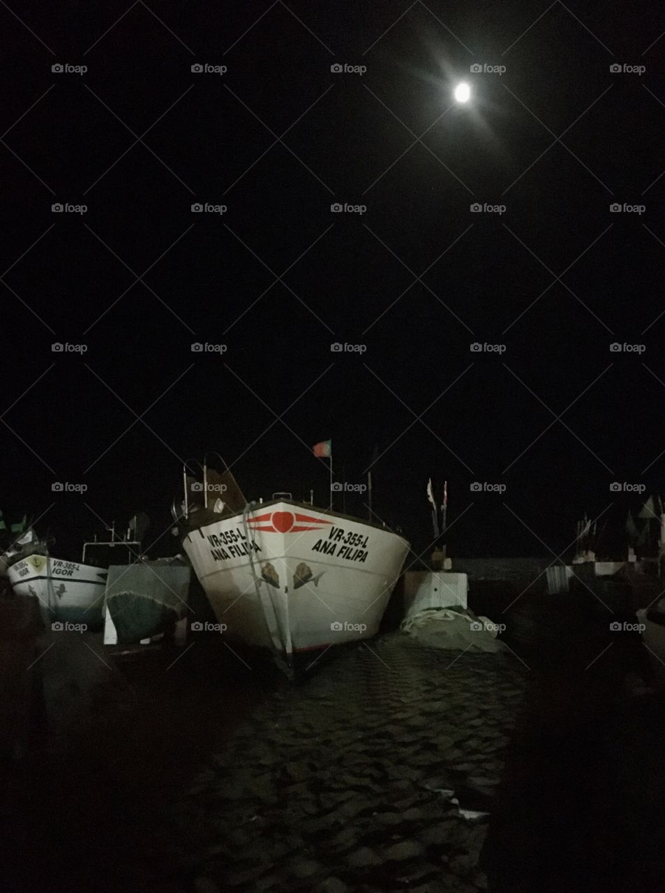 Fisherman boats at night