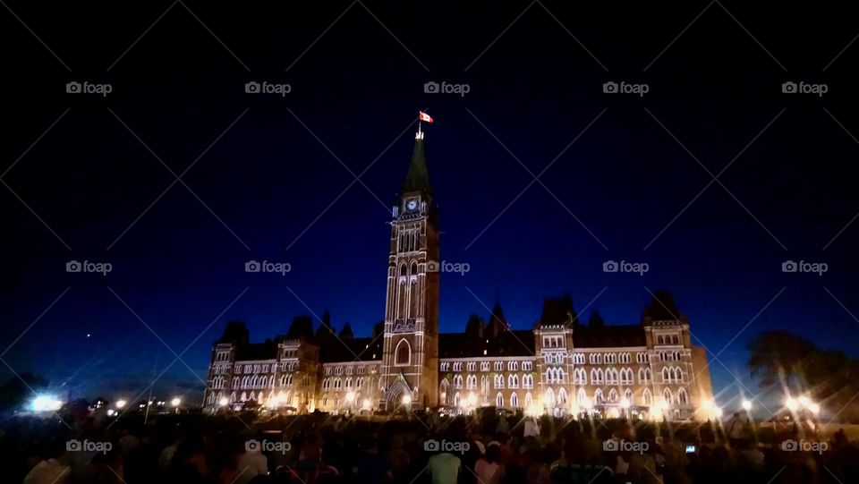 The Parliament of Canada proudly lit during the summer lights show