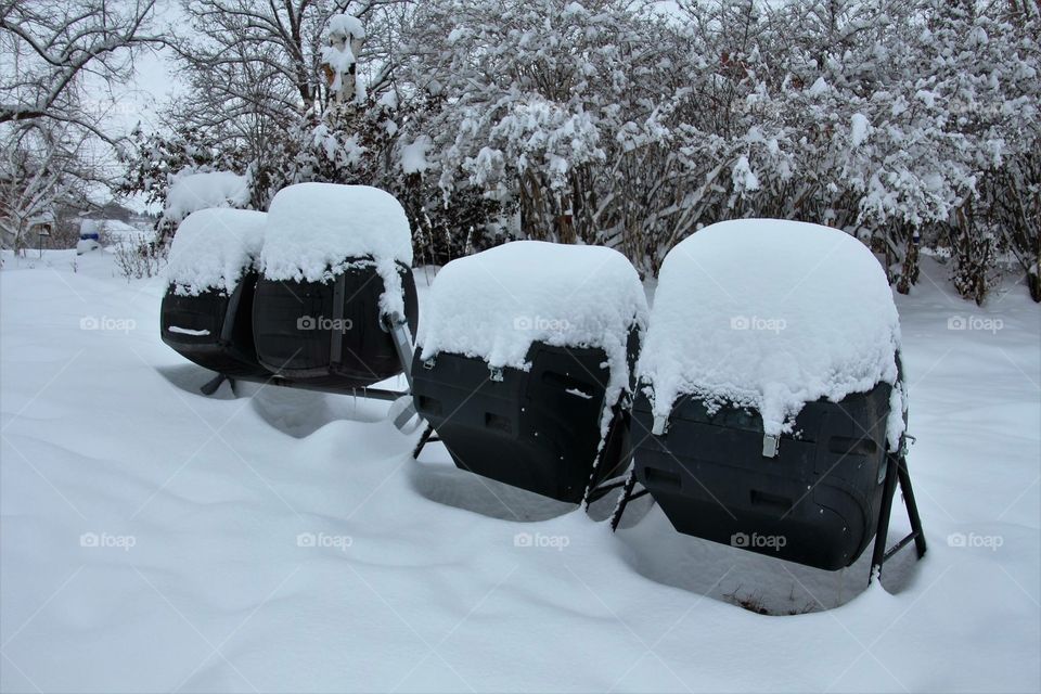 Thick snow on top of composters