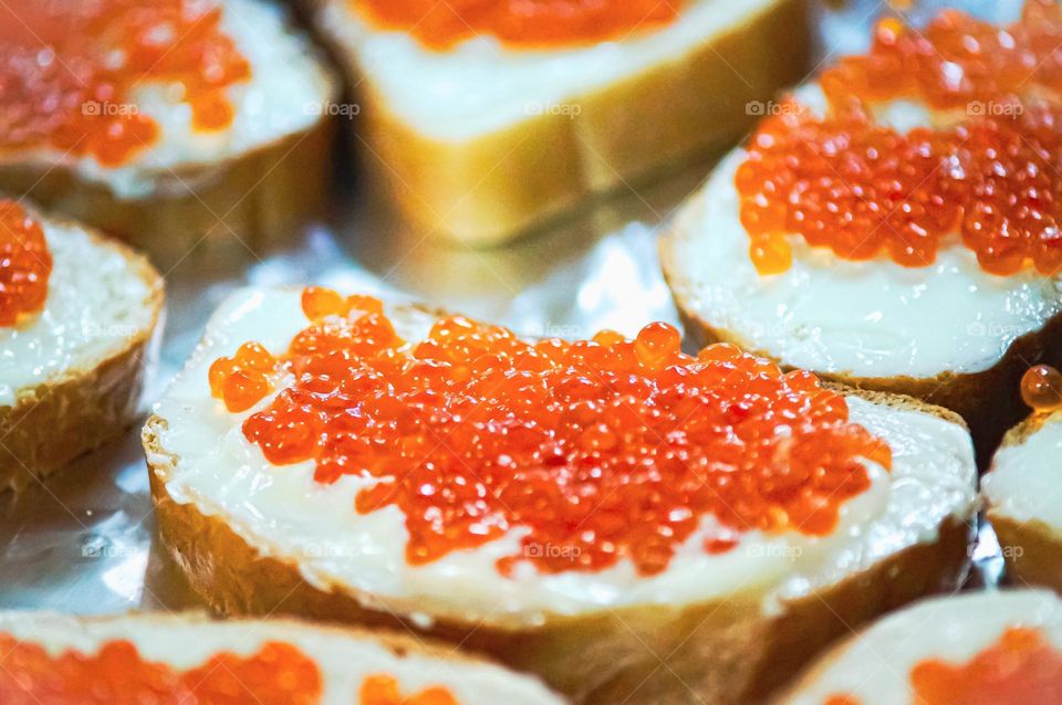 Sandwiches with red caviar