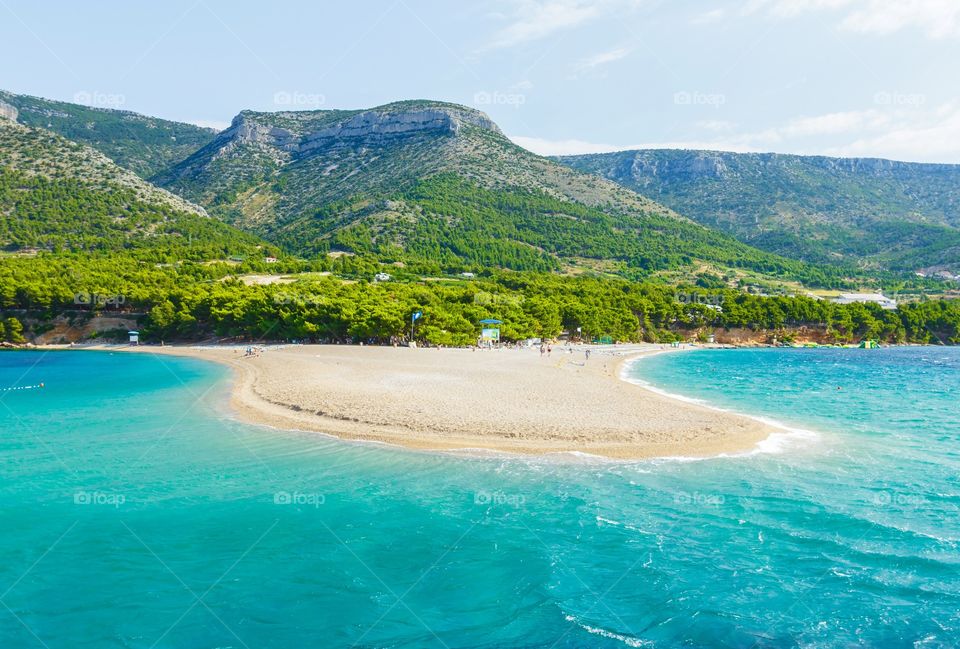 Summer beach . Beautiful beach at Bol on Brac island in the morning time, Adriatic sea, Croatia, Europe 