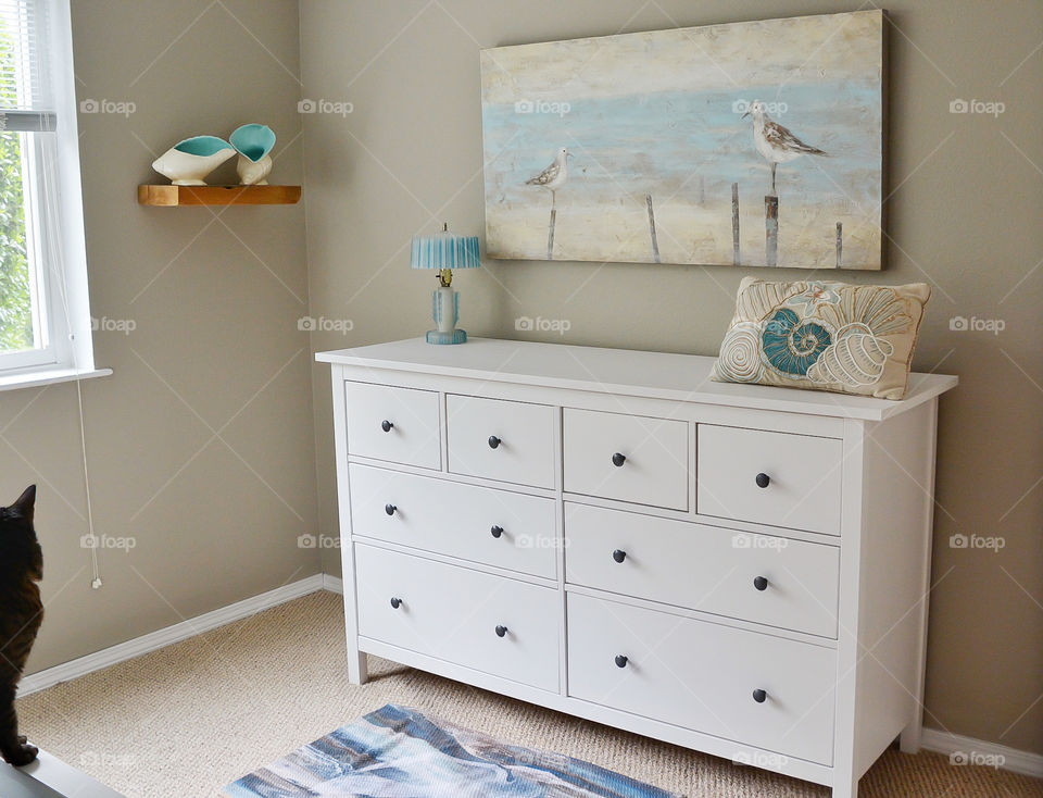 IKEA dresser in coastal themed bedroom