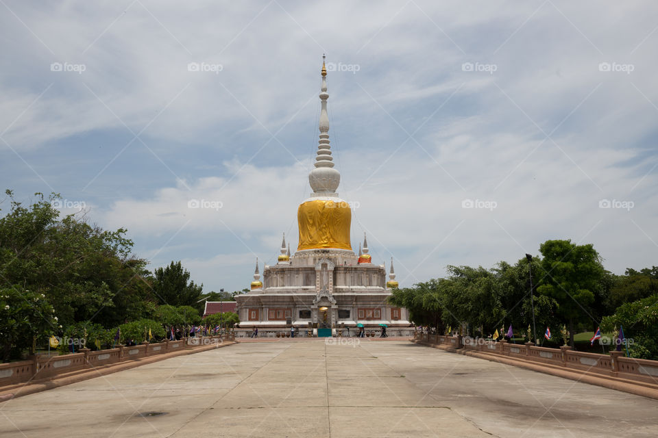 Pagoda in the temple of Thailand with clear cloud blue sky