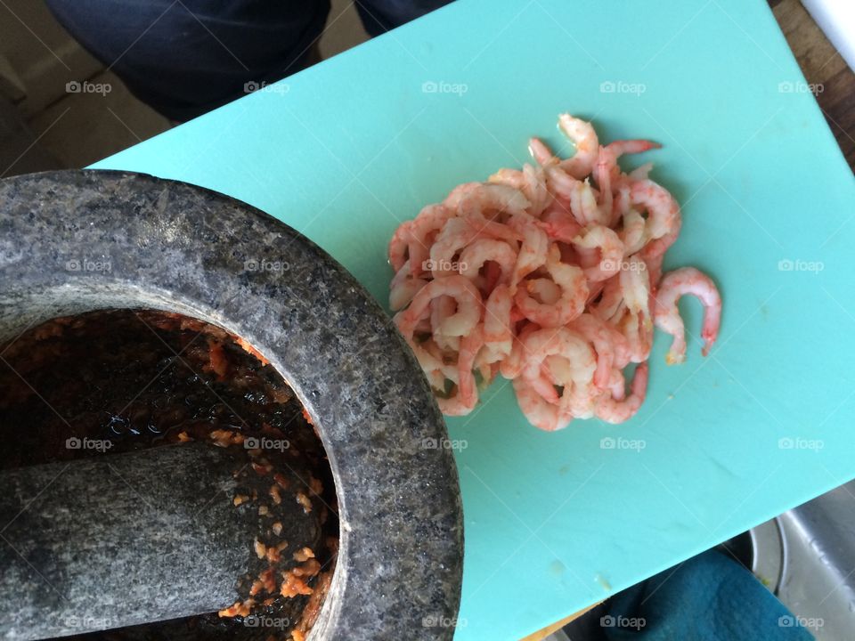 Preparing shrimp dish
