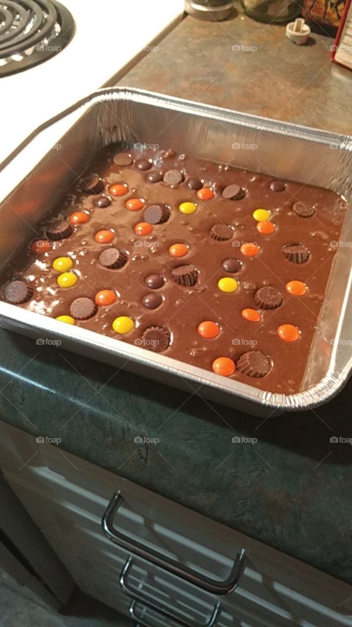 preparing Reese's brownie mix