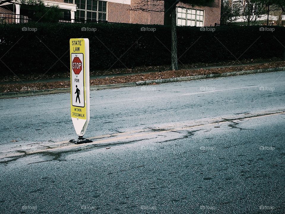 Stop for pedestrians on the roads sign