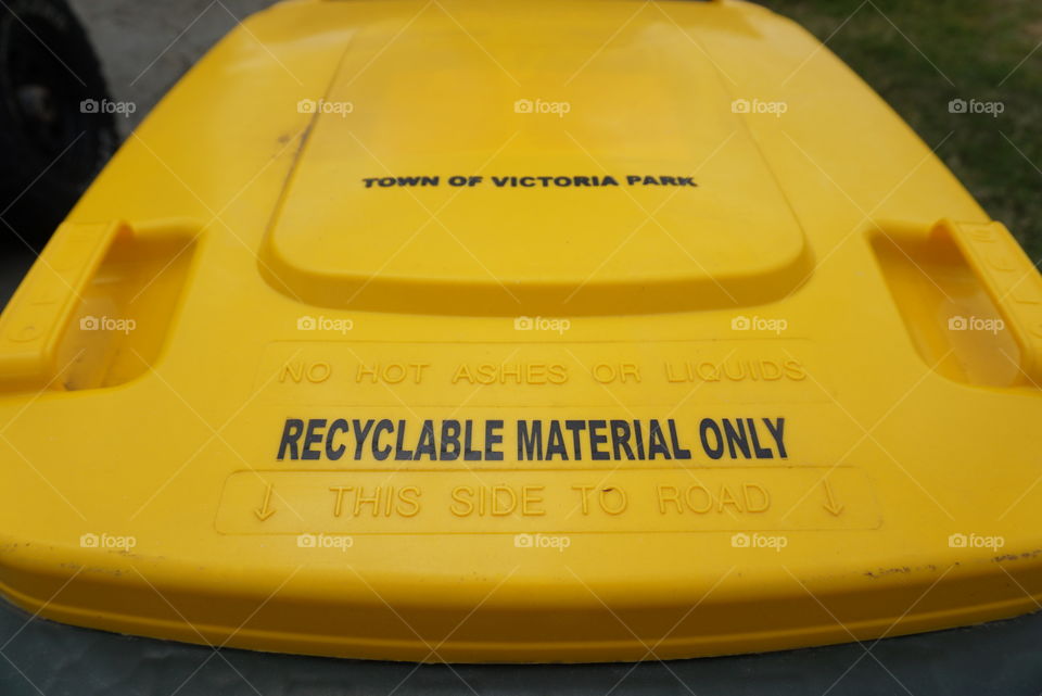 Notice on bin for recyclable material only.