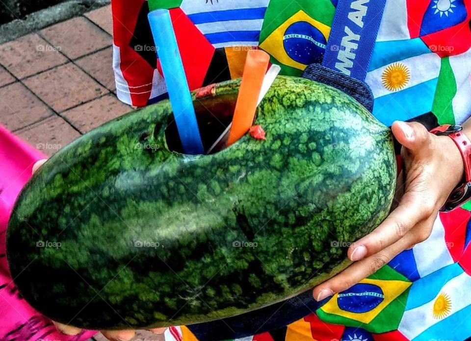 Fruits!:child eating watermelon with straw. looks funny, very satisfied, cool and juicy.