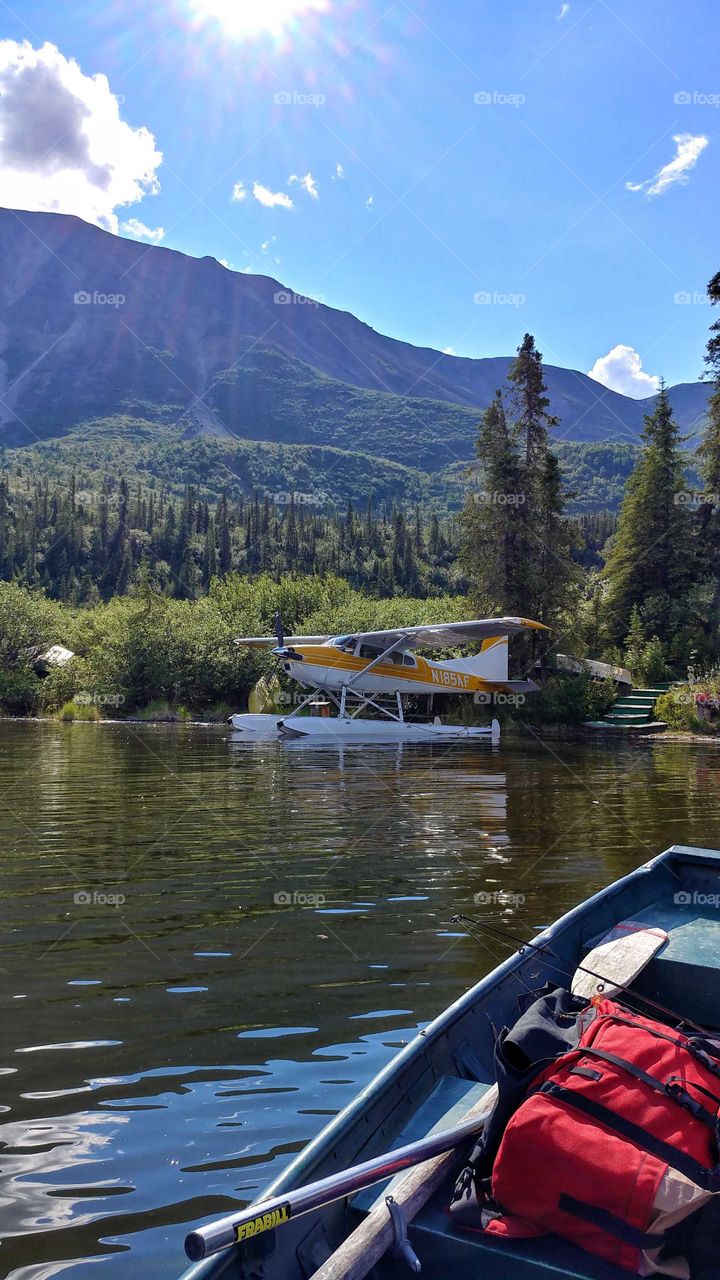 Blue sky, deep water lake and a plane to get there and fish! This is heaven in Alaska.