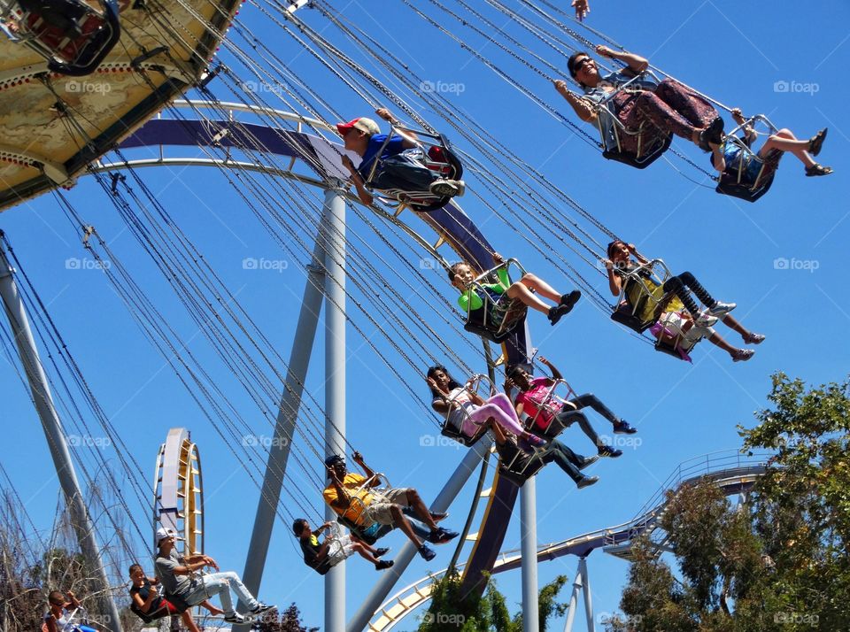 Kids On An Amusement Park Ride