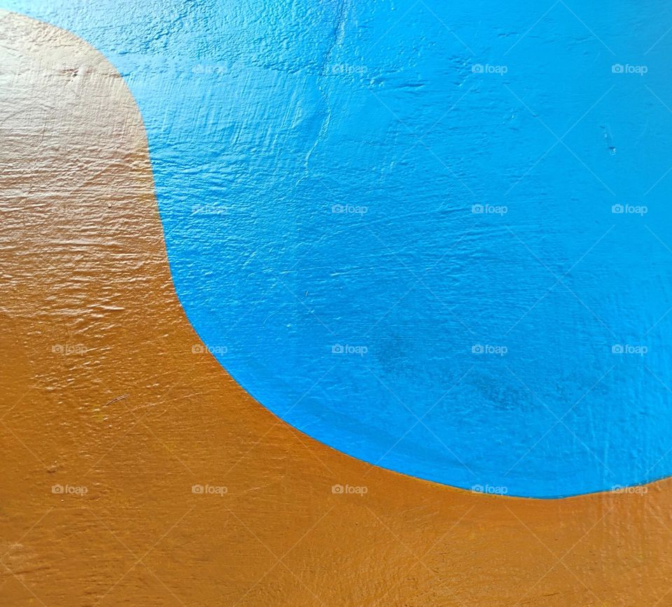 Textura. Azul e laranja.  A cor azul está associada a tranquilidade e serenidade, enquanto o laranja está ligado à energia e entusiasmo. Juntas, essas cores podem criar um ambiente moderno, jovial, romântico e aconchegante