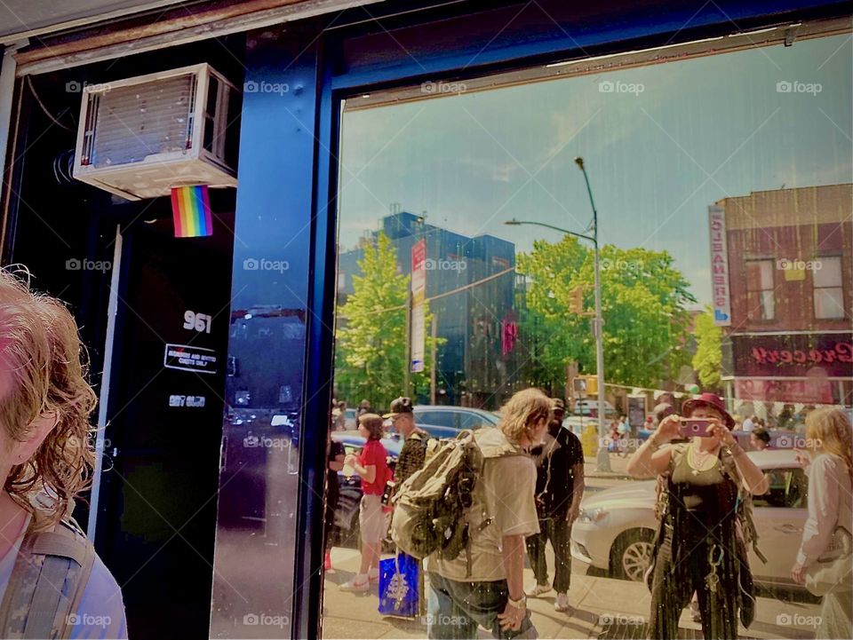 We made it through the line & are on our way to photograph one another w our treasure in front of the “RESPECT” mosaic next to KEYFOOD on “Fulton St” when I decided to take this intricate double reflection picture. 2022. Hypnotic Productions