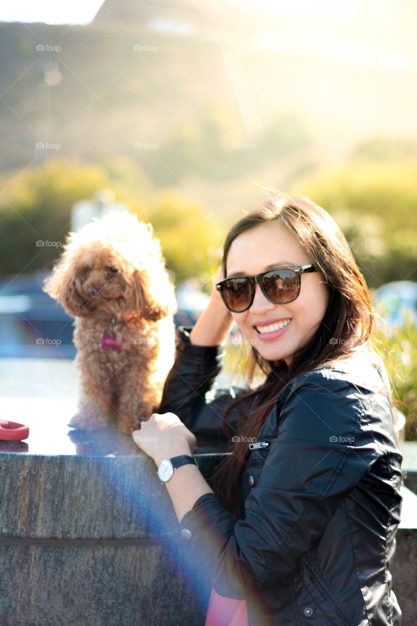 Bond between a dog and owner. Taken after a 10 mile hike across the Golden Gate Bridge in perfect weather 