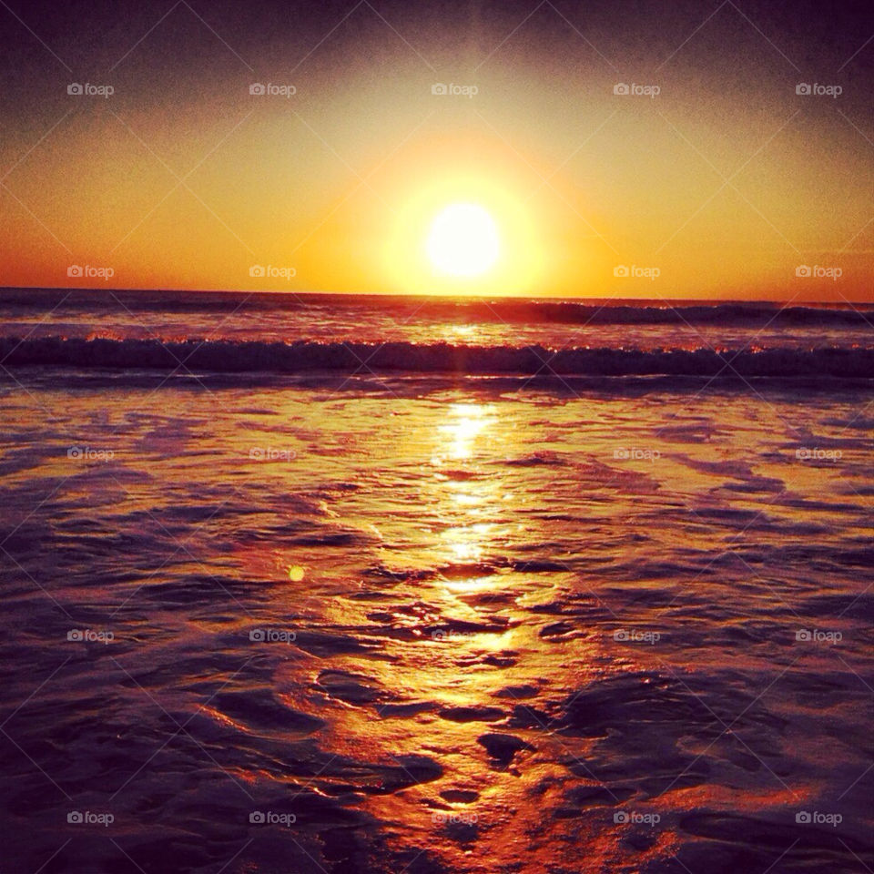 Sun rising over the ocean