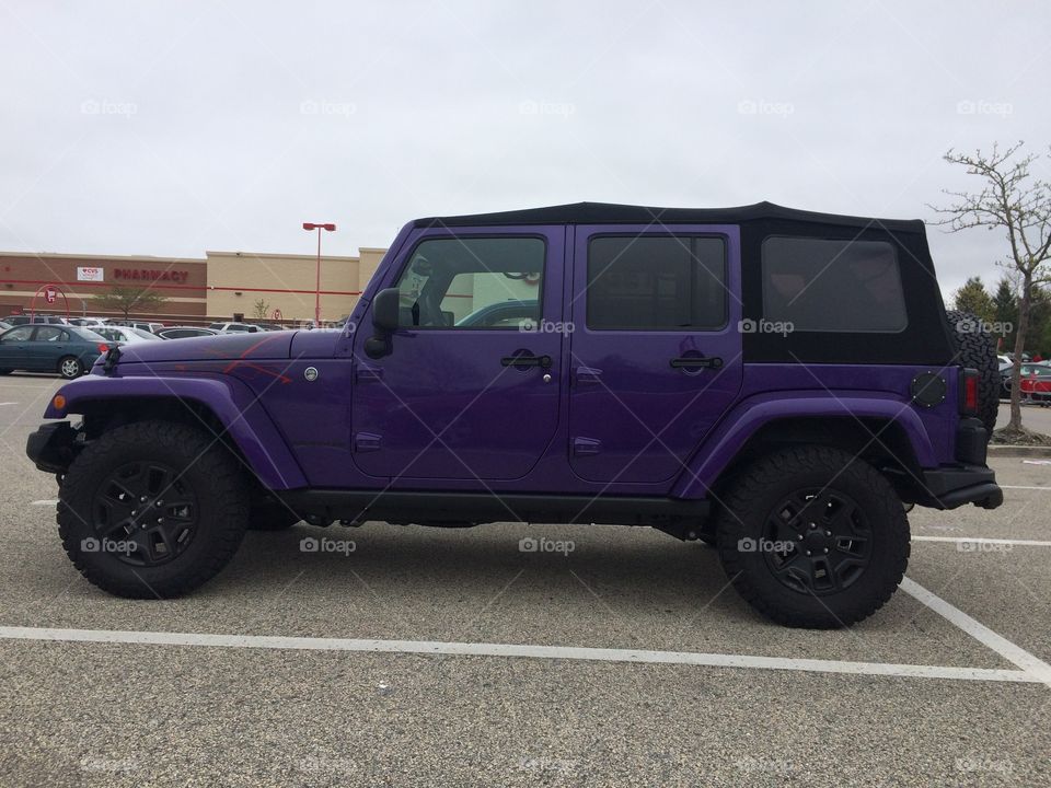 Jeep purple.  Would be sweet lifted and with a hard top. 