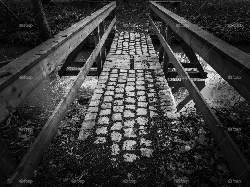 Old bridge over a river.
