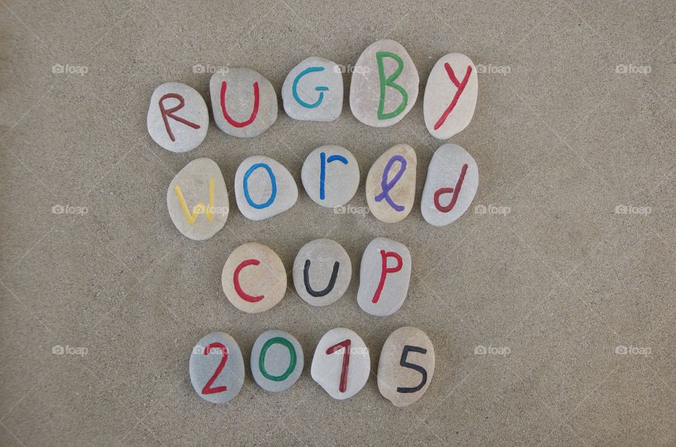 Rugby World Cup . Rugby World Cup souvenir on colored and carved stones 