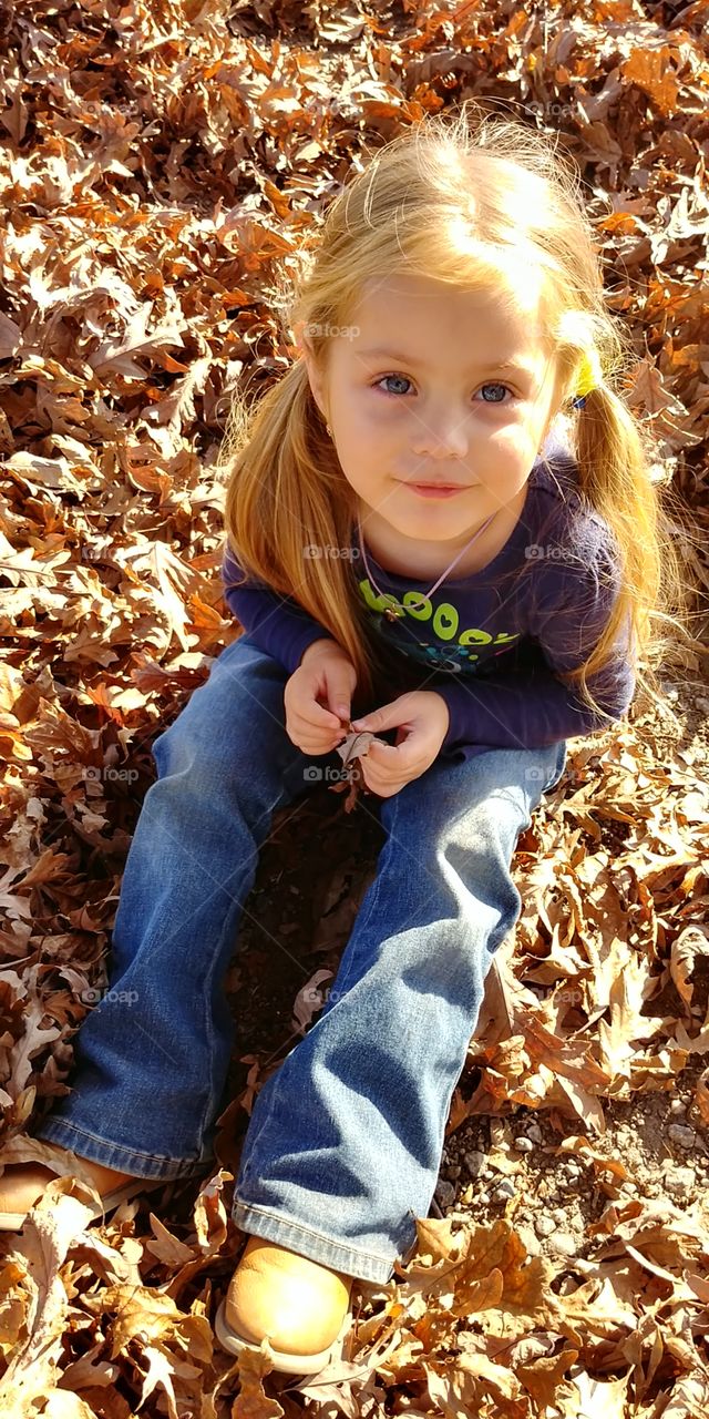 playing with leaves