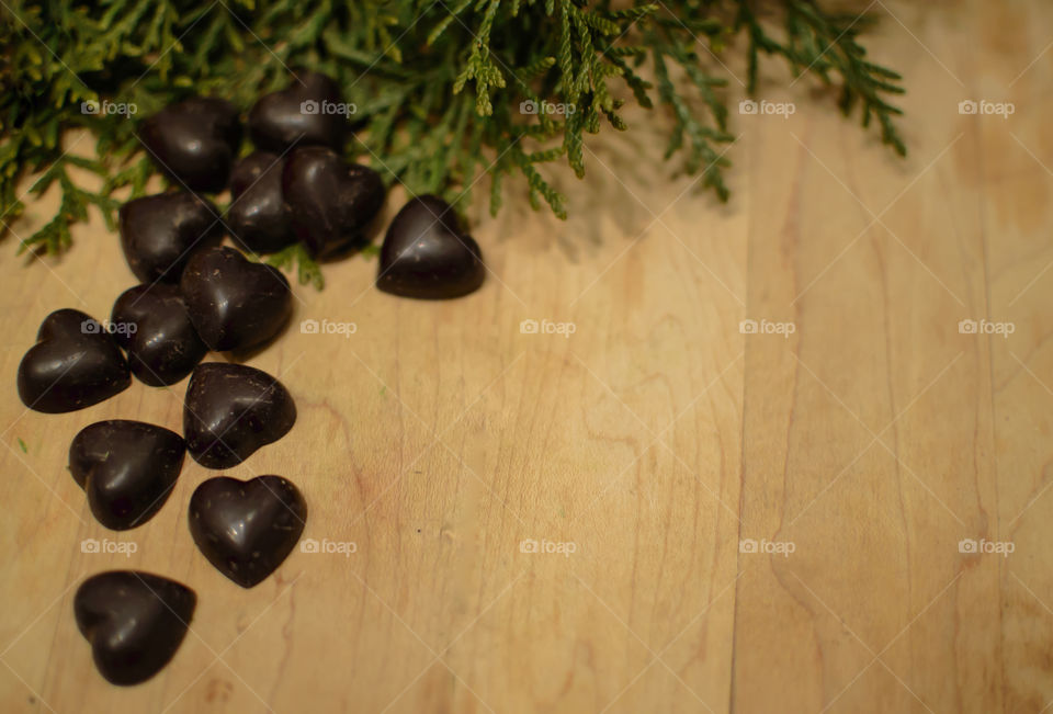 Heartshape dark chocolate on table