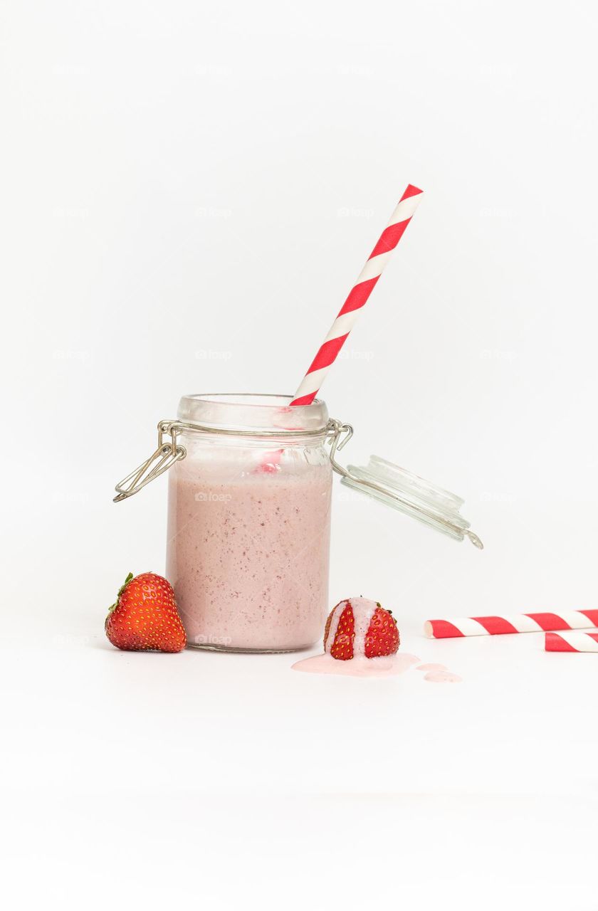 Glass jar with smoothie or milkshake 