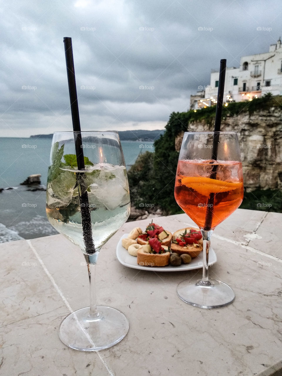 two cocktails for aperitif next to the sea in Italy