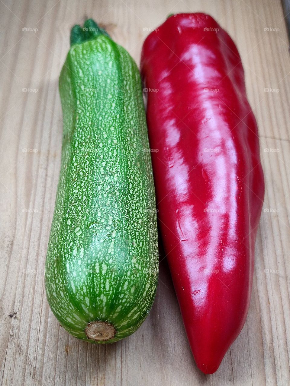 Green zucchini and red chili.  Color contrast