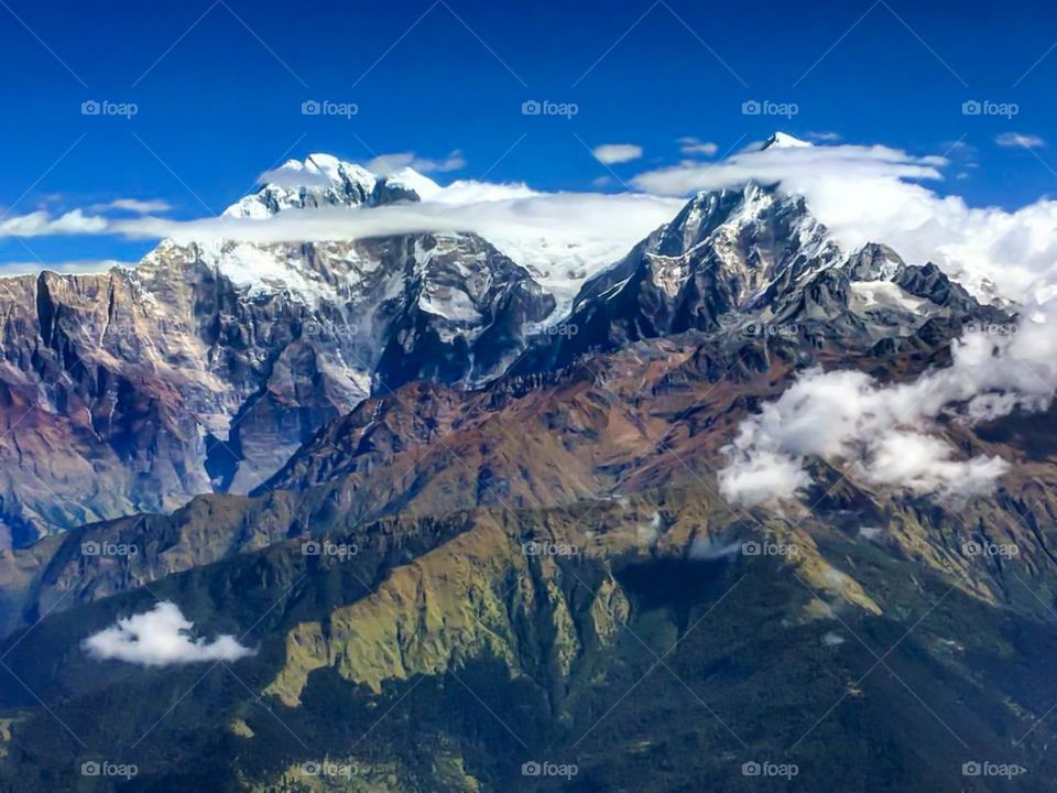 The Annapurna Range as seen from the back seat of a helicopter. Took this photo on the ride out of Dhaulagiri in Nepal.