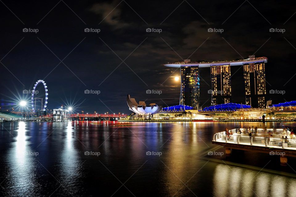 reflection on the bay at night