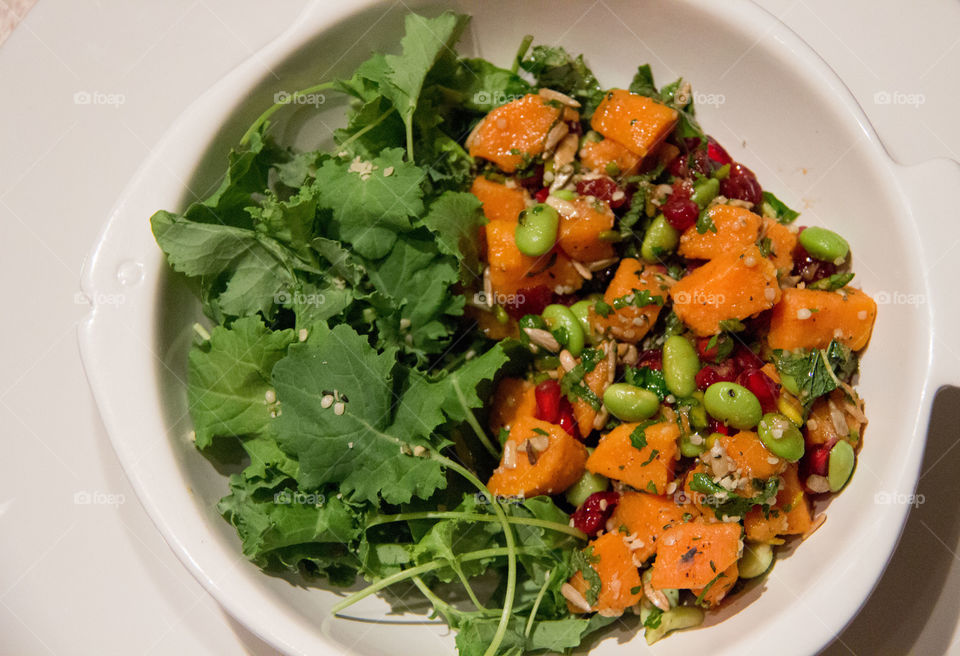 Baby kale and sweet potato salad with edamame beans and cranberries 