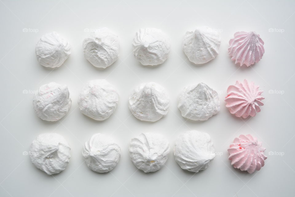 sugar meringues candy top view texture white background