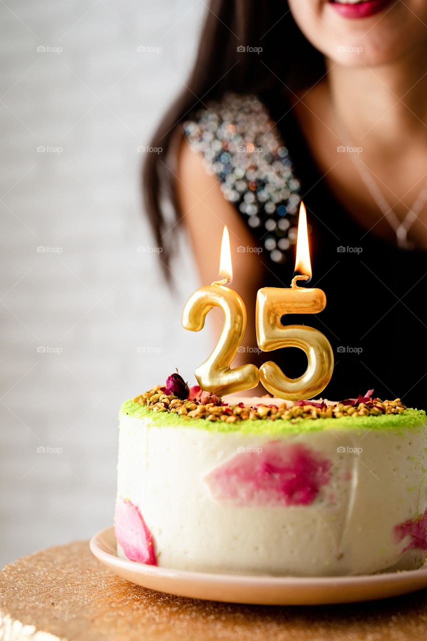 25 candles on birthday cake