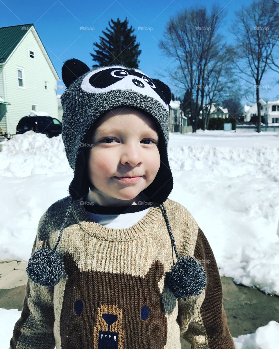 My son enjoying the snow fall