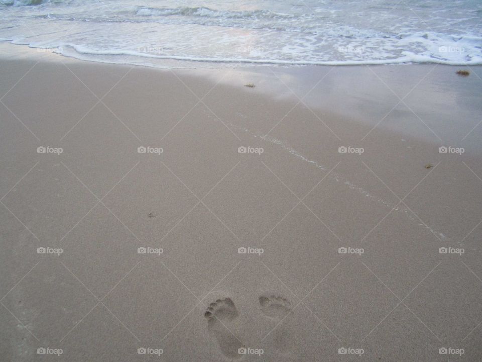 Sand water beach footprint