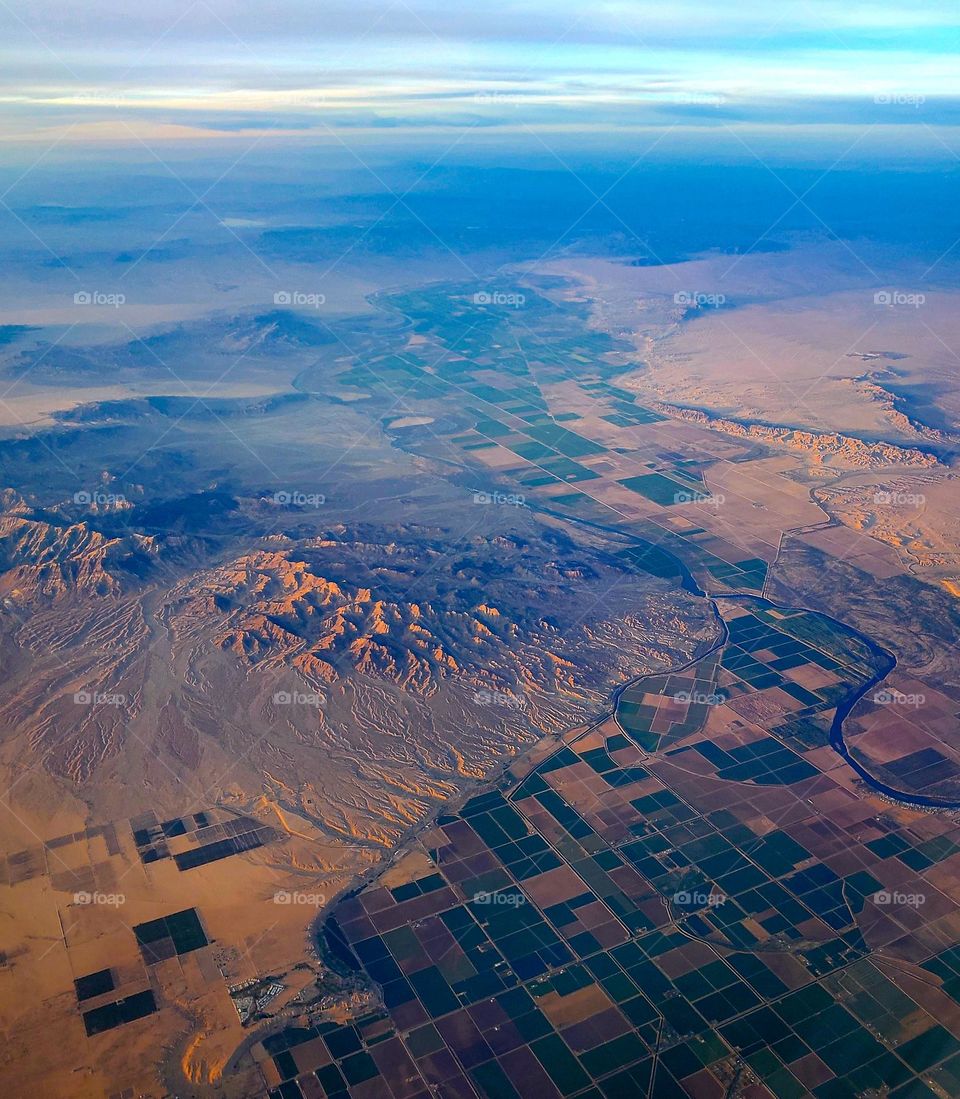 The dividing line between California and Arizona is the Colorado River, seen as it snakes through the desert