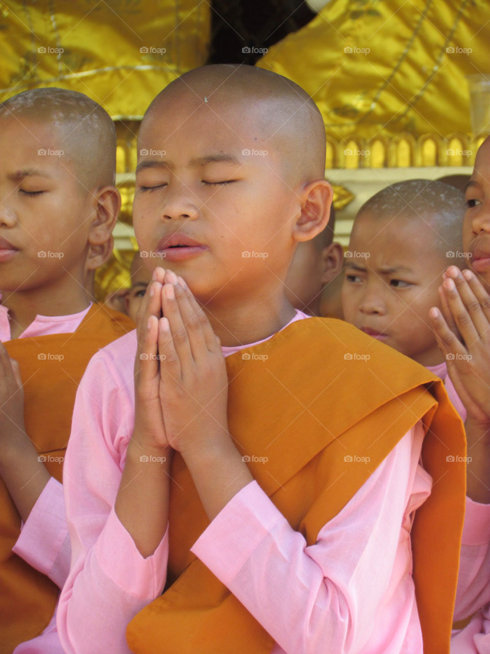 Child nun praying