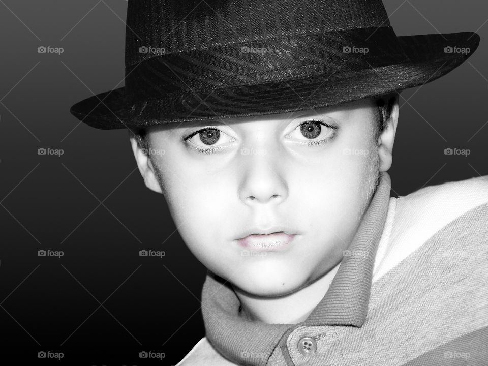 Dashing young man with the gorgeous eyes. My son fell in love with this hat, and it sure does suit him and those very lovely eyes of his!