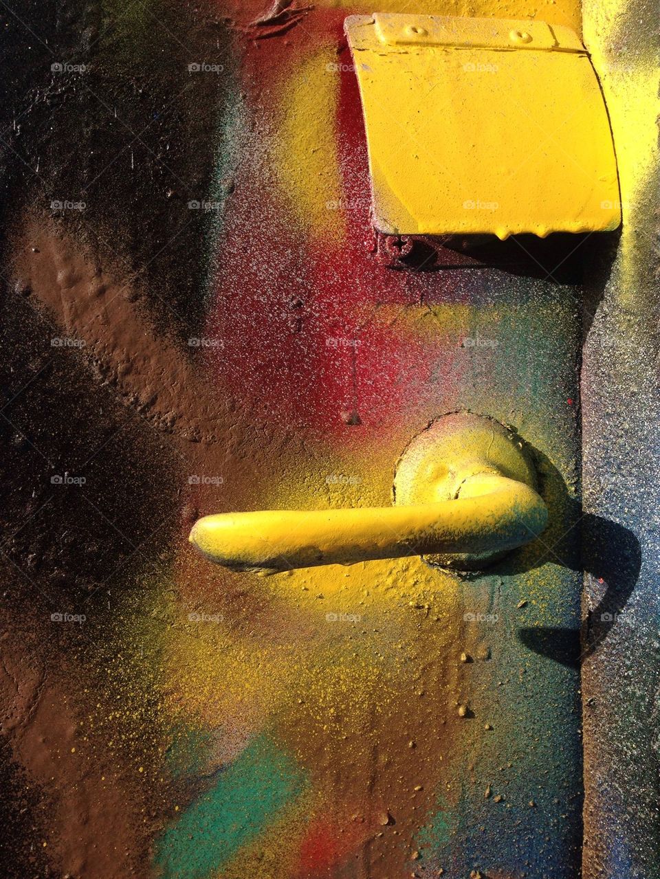 Yellow graffiti handle.