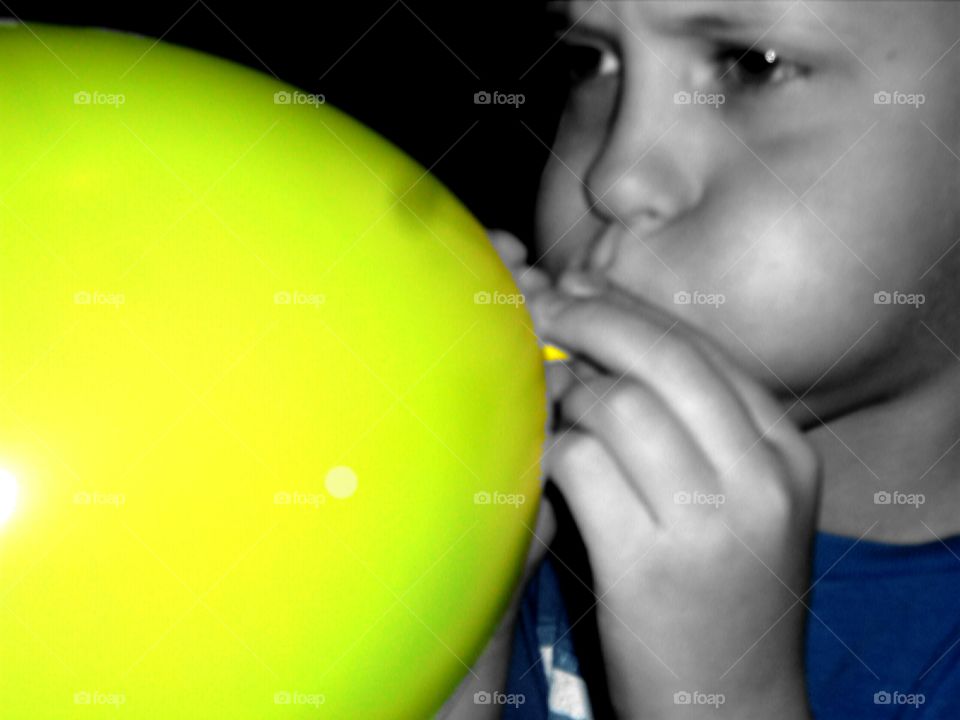 Inflated!. My son blowing up a balloon!