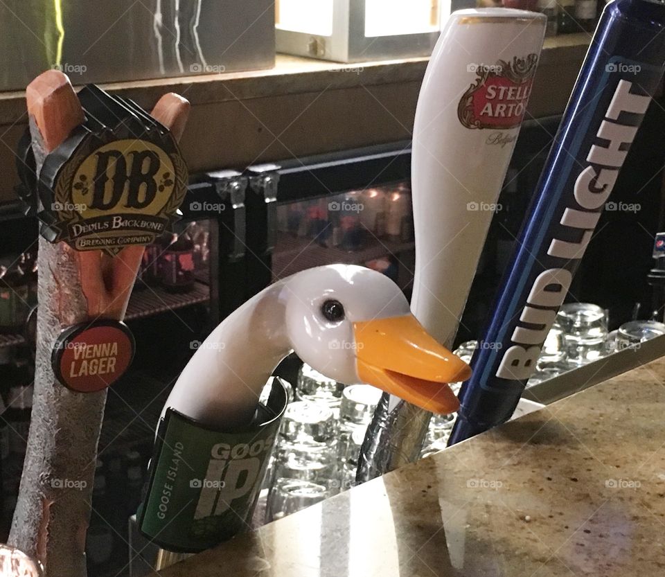 A beer tap with a face