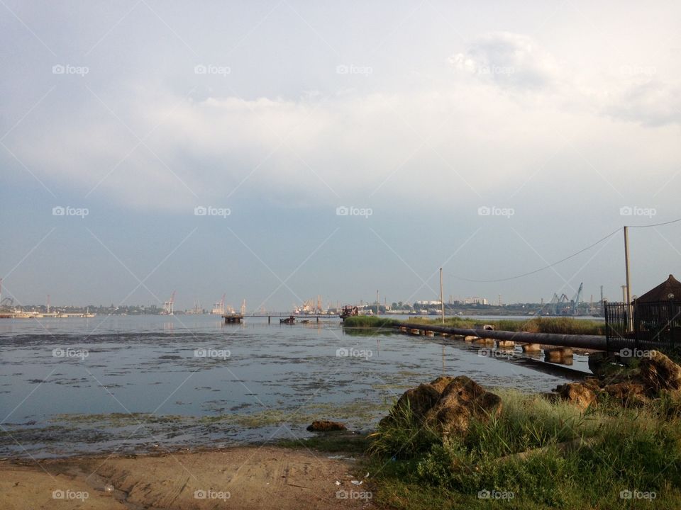 Landscape on a port with dirt on a bank