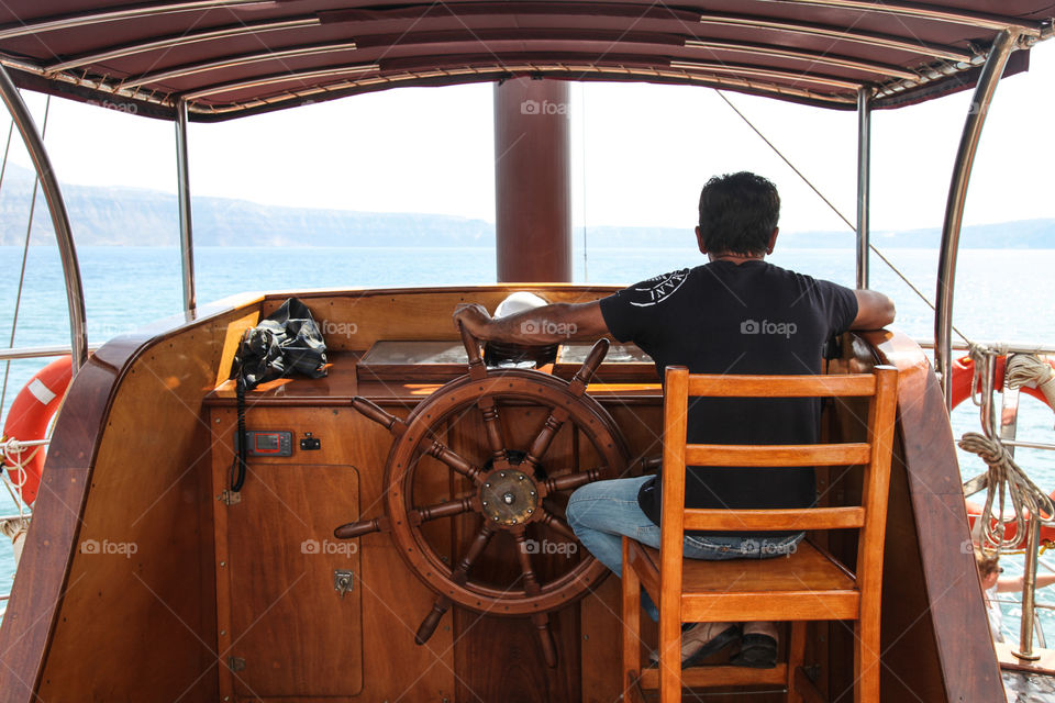 Captain on a boat. 