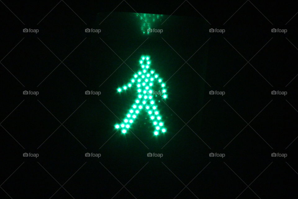 robot green light. Lisbon night walk
