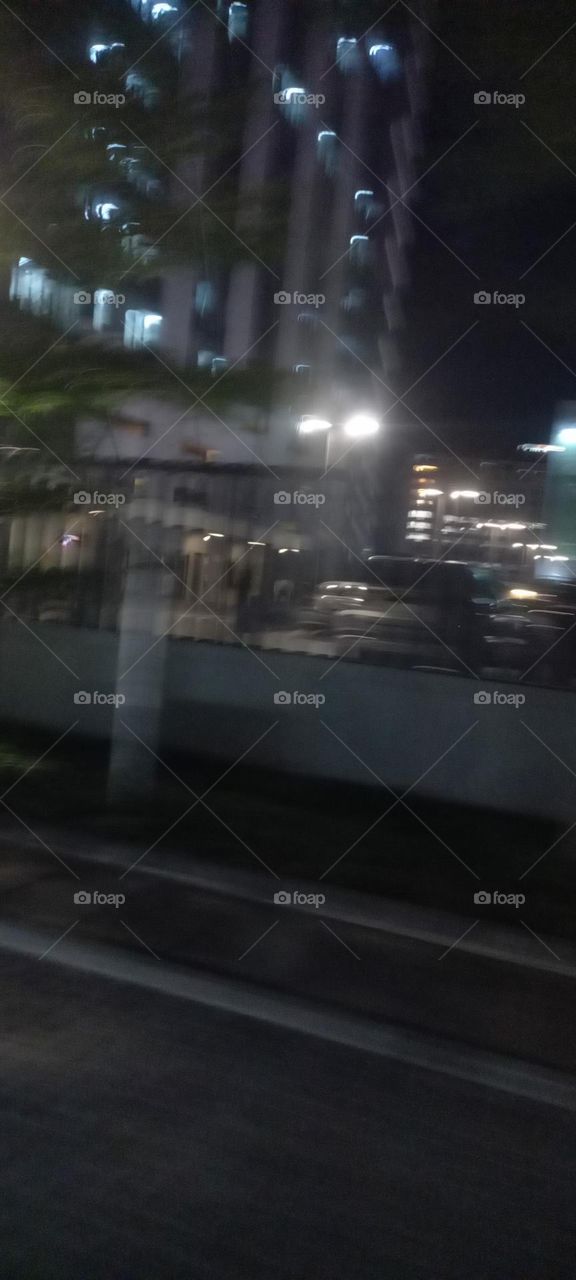 Twinkling windows , the beauty of evening light. Bask in the beauty of evening light with the view of light twinkling from these windows at night