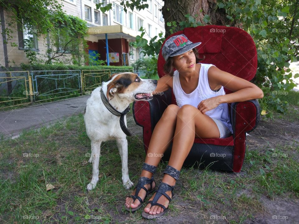 Girl brunette with cute dog