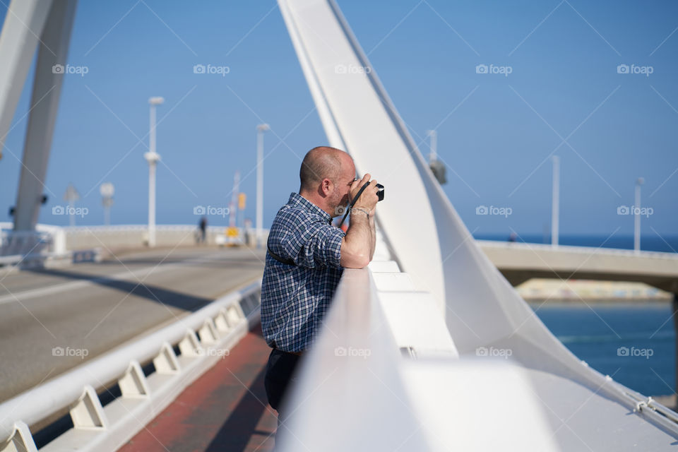 Male photographer clicking photograph