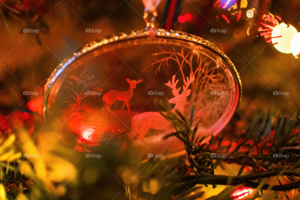 Reindeer Christmas ornament on the Christmas tree.