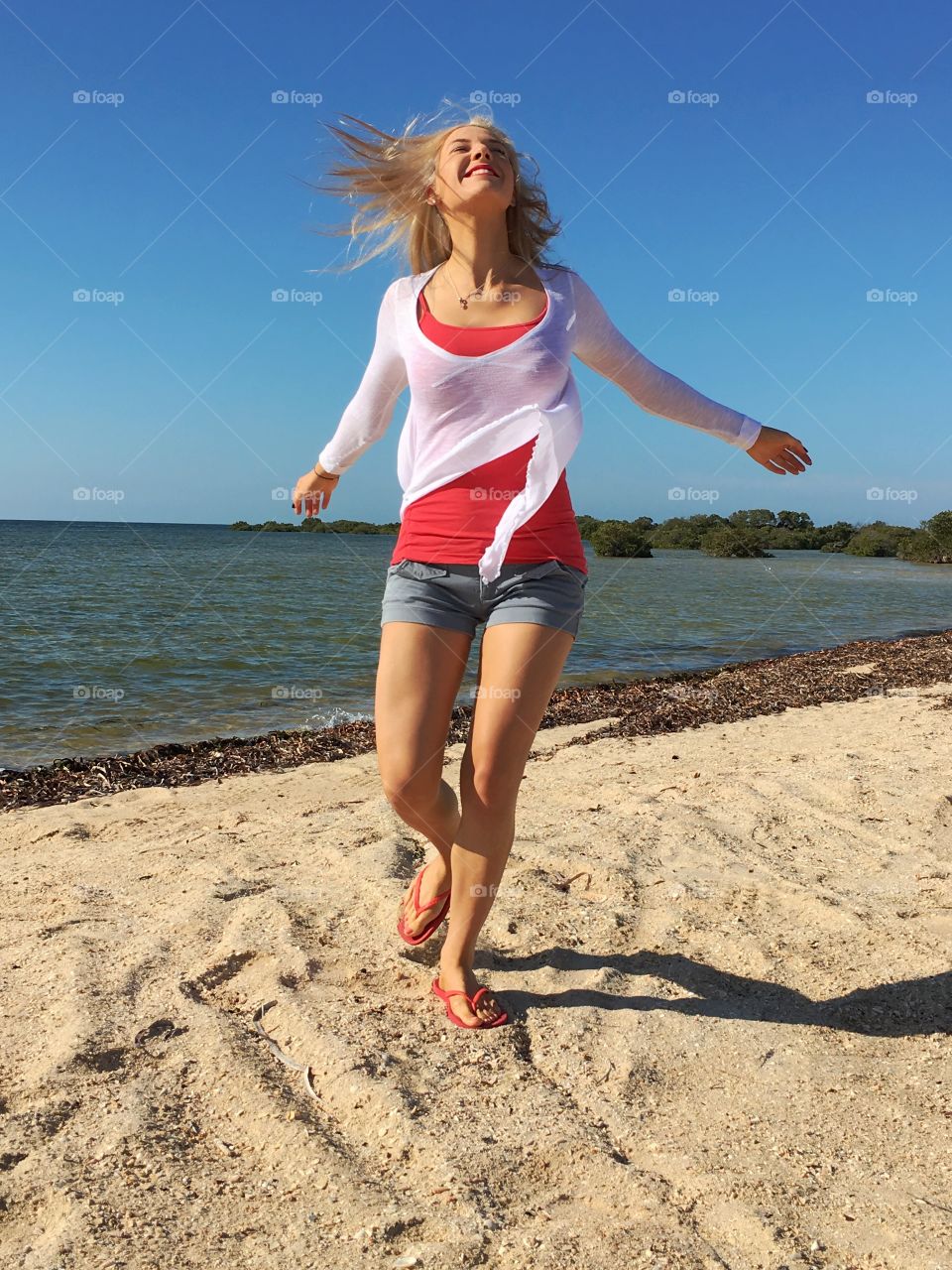 Young woman enjoying at beach